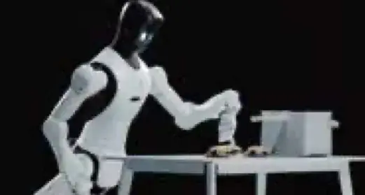 Robot humanoide manipulando objetos en una práctica docente
